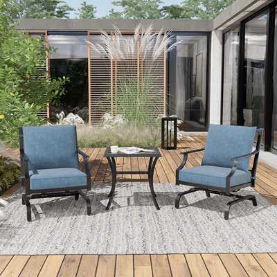 Chaise berçante de patio avec coussins