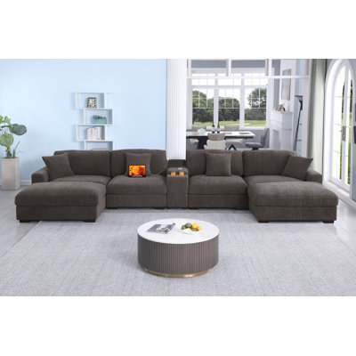 7 Piece Upholstered U-shape Sectional with Cup Holders & Charging & Storage by Latitude Run