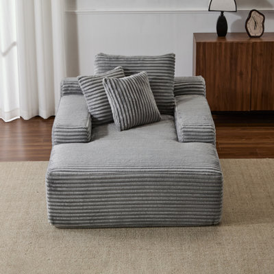 Chaise longue avec 3 coussins décoratifs et accoudoirs larges