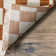 Dominique Abstract Checkered Fringe Area Rug
