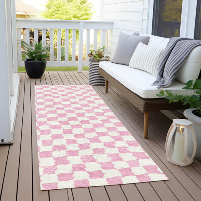 Tapis intérieur / extérieur rose lavable à la machine Xhevrie