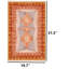 Tapis terracotta à triangles géométriques