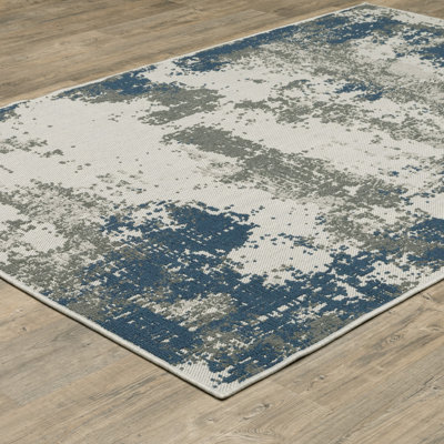 5' X 7' Blue And Beige Abstract Stain Resistant Indoor Outdoor Area Rug