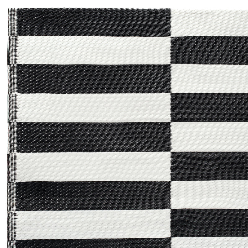 Black and White Reversible Synthetic 6' x 9' Outdoor Rug
