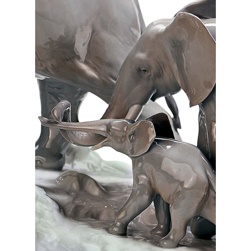 Elephants Walking Figurine