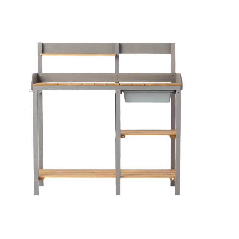 Établi de jardin dans la cour arrière, table de rempotage en bois avec armoire, plan de travail généreux, grande surface de travail extérieure de style brun et gris, fabrication en bois,