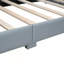 Grand lit plateforme tapissier en similicuir