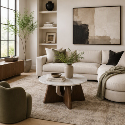 Table basse moderne avec plateau en marbre et base en piédestal, blanc et brun