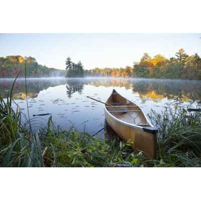 " Canoe On Calm Lake "