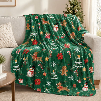 Couverture de Noël festive en flanelle (1 pièce) avec motifs Père Noël, bonhomme de neige, rennes et bonhomme en pain d'épice – Douce et chaude pour se détendre à la maison ; cadeau idéal pour décorer la literie et le canapé pendant les fêtes.