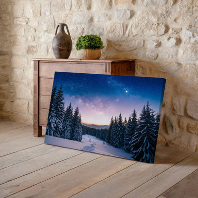 Canvas A Serene Winter Landscape Featuring A Winding Snow Covered Path Wall Art Leading Through A Dense Forest Of Tall Evergreen Trees Canvas Wall Art