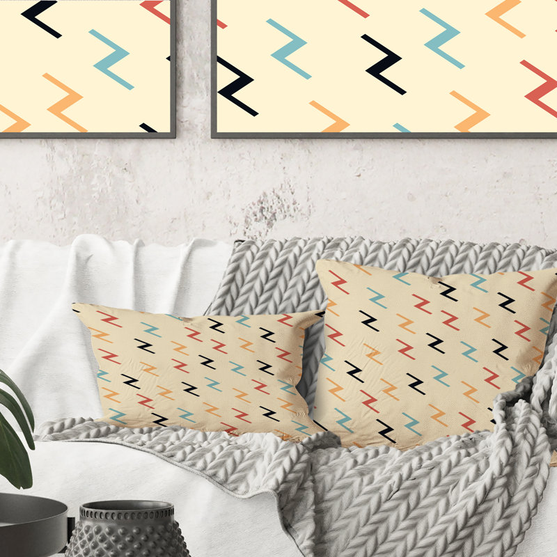 Coussin décoratif à motif zigzag bleu, orange et jaune