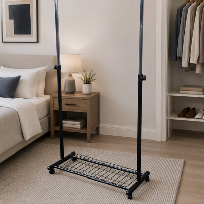 Porte-manteau roulant en métal noir de 62 pouces avec roulettes