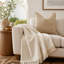 Canapé sans accoudoirs 1 place avec repose-pieds en chenille beige avec jupes amovibles Windsor