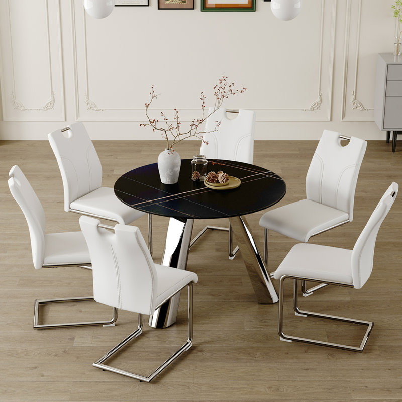 42-Inch Black Sintered Stone Round Table with Stainless Steel Legs and White PU Leather Dining Chairs