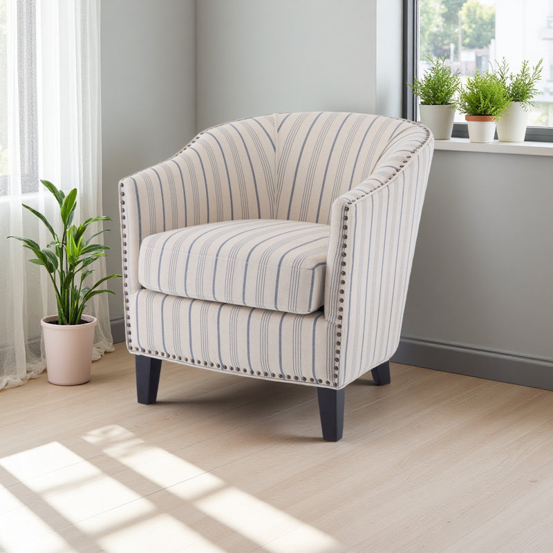 Fauteuil demi-tonneau rembourré à rayures