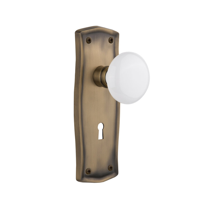 Prairie Plate with Decorative Keyhole and White Porcelain Door Knob, 2-3/4”, Antique Brass