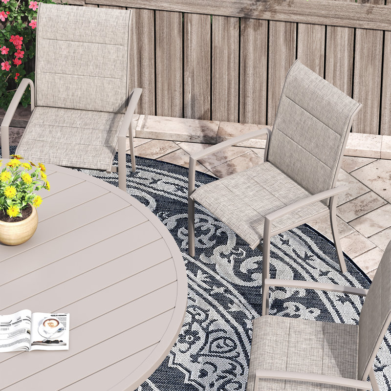 Ensemble de salle à manger de patio avec table de salle à manger ronde 47,2 po et 6 chaises rembourrées en textilène