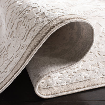Calidia Oriental Cream/Ivory Area Rug