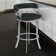 Kellum Swivel Counter and Bar Height Barstool with Arms in Faux Leather Upholstery and Metal Legs
