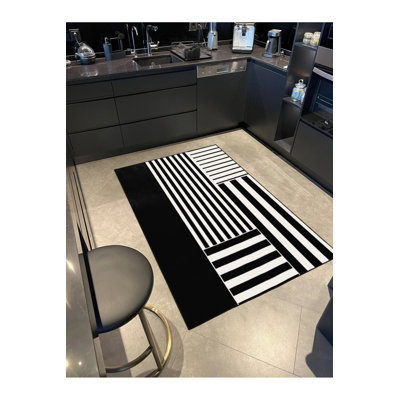 Tapis tissé à motif géométrique noir à motif géométrique moderne