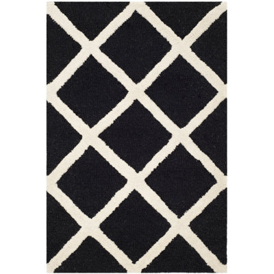 Tapis noir / blanc en laine touffeté à la main Sanyla