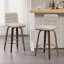Tabouret pivotant rembourré Bomia avec structure en bois massif et dossier en similicuir en L-145104832-221022963