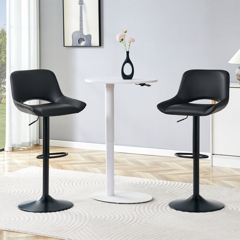 Ensemble de 2 tabourets de bar réglables Modern Modern, matériau en polyuréthane noir, avec repose-pieds, peut supporter jusqu'à 250 lb, convient aux bars à la maison et aux îlots de cuisine.