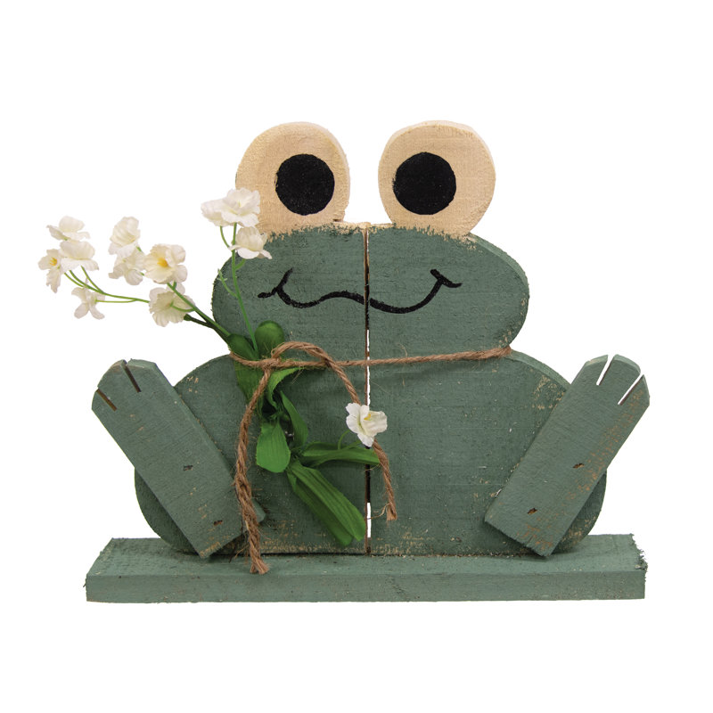 Grenouille joyeuse en bois rustique sur base avec fleurs