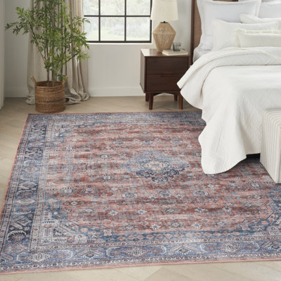 Tapis oriental bleu et rouge tissé à la machine 5 pi x 7 pi