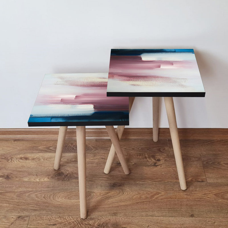 Ensemble de 2 tables gigognes élégantes, motif abstrait en bleu marine, blanc et rose | 100% panneau de fibres à densité moyenne avec pieds en bois de hêtre | Plus grande table: 13,8 po x 18,5 po x 13,8 po, plus petite table: 13,8 po x 16,5 po x 13,8 po | Parfait pour le salon et la décoration moderne