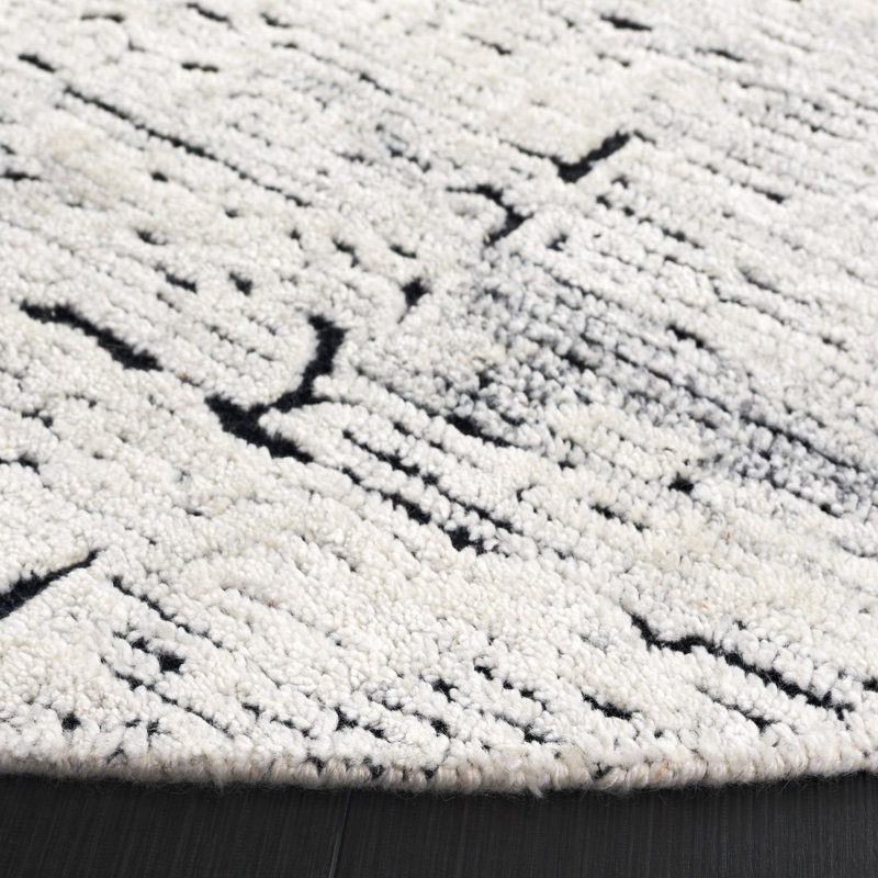 Anindita Hand Tufted Wool/Cotton Rug in Black/Ivory, Round 6"