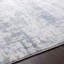 Tapis abstrait bleu / gris clair / blanc Magallanes-144949197