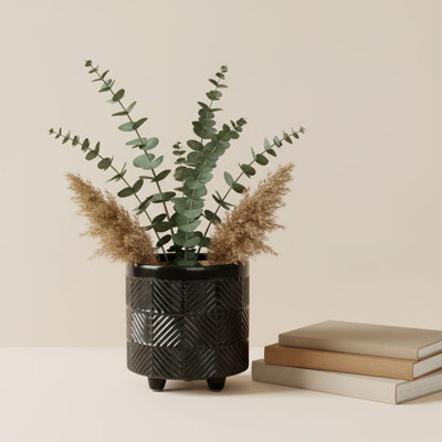 Boîte à fleurs noire en céramique texturée