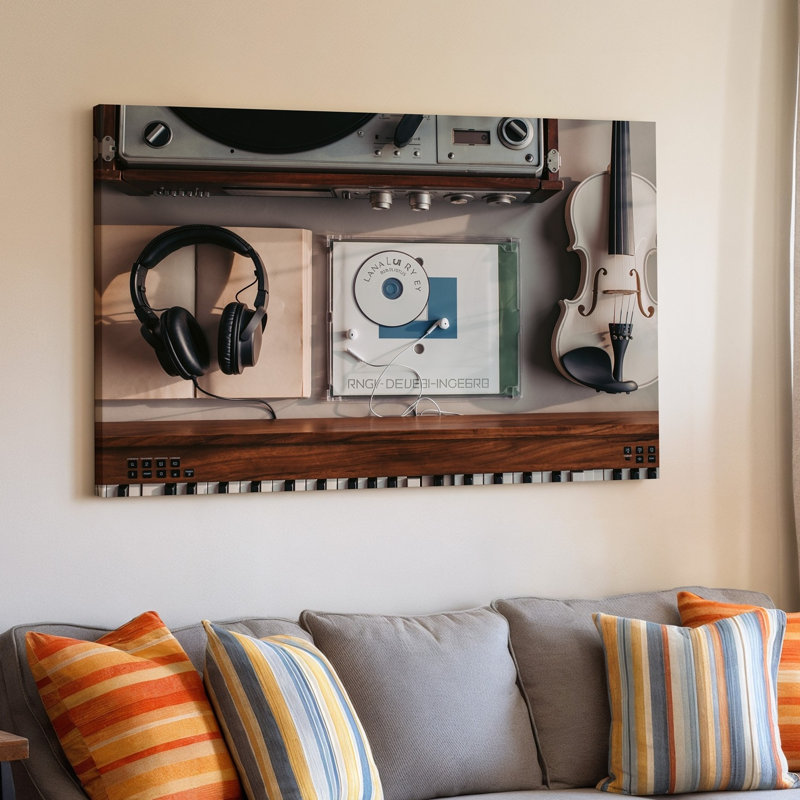 Toile «A Cosy Artistic Flat Lay Lay» mettant en vedette divers éléments musicaux, y compris l'art mural Une paire d'écouteurs noirs reposant sur une toile ouverte