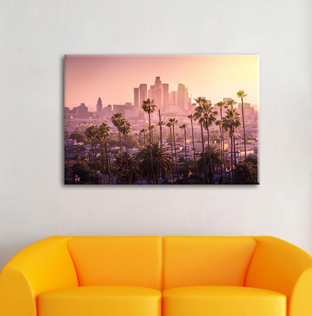 Leinwandbild Palmen vor der Skyline von Los Angeles