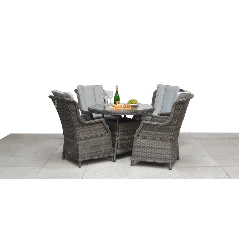 Cadmose 4 - Person Patio Dining Set Umbrella Hole Included Round Table with Cushions Included
