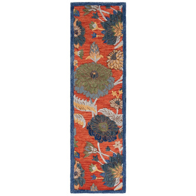 Daundra Wool Cotton Performance Floral Rug in Orange/Blue