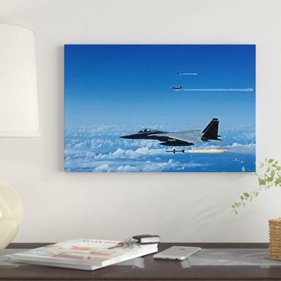 " F-15 Eagle Aircraft Fire Aim-7 Sparrow Missiles " by Stocktrek Images