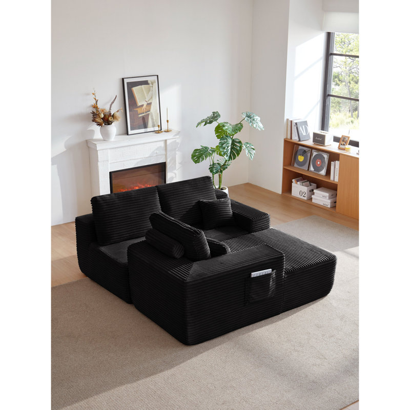 Canapé modulaire en tissu noir avec méridienne confortable, design moderne pour le salon