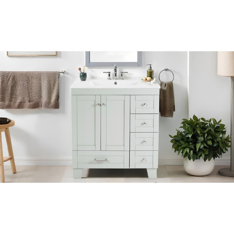 de salle de bain bleu gris avec lavabo en céramique, structure en bois massif, tiroirs à fermeture en douceur, solution de rangement moderne pour les salles de bain organisées