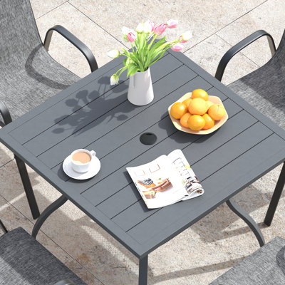 4-Person Square Patio Dining Set With Stackable Chairs