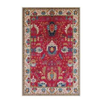 Tapis à motif oriental rose