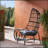 Cocoon Chair With Basket Shape And Faux Rattan, Perfect For Cozy Lounging And Modern Decor.