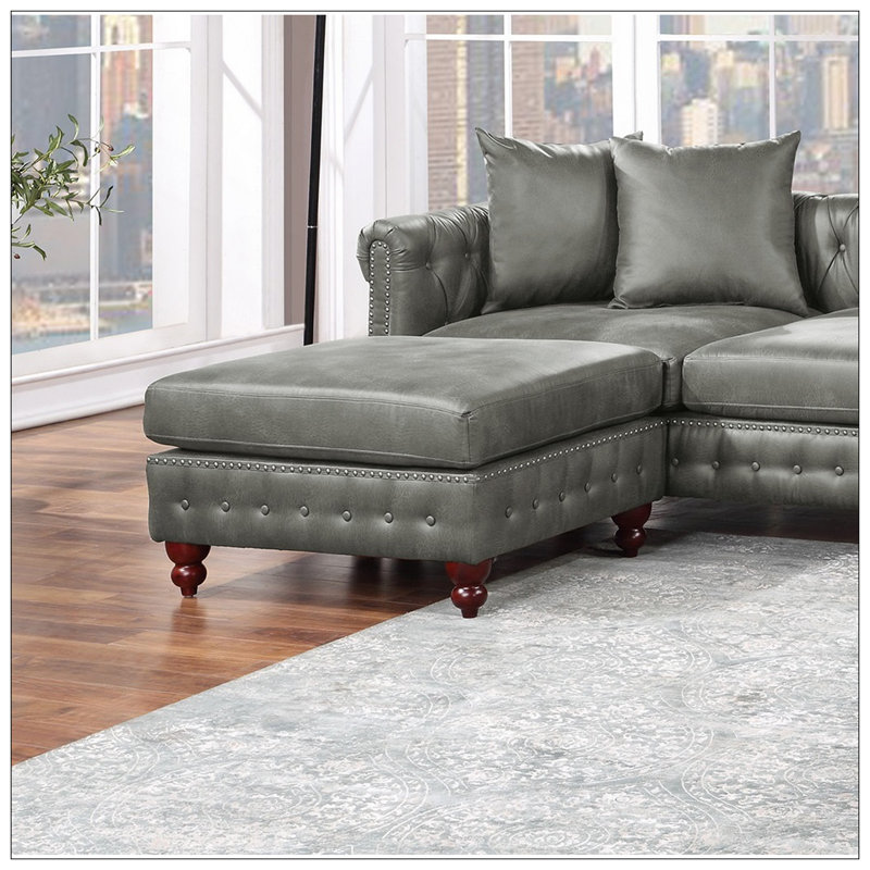 Ensemble de canapé modulaire 4 pièces réversible en similicuir gris ardoise et 2 méridiennes réversibles et 2 coussins de repose-pieds capitonnés