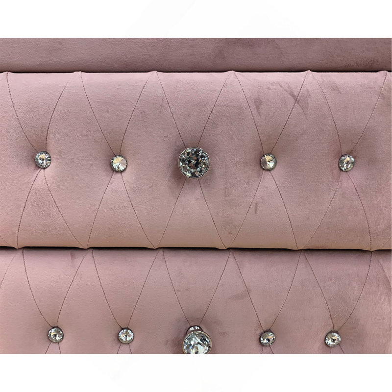 Commode rose en tissu