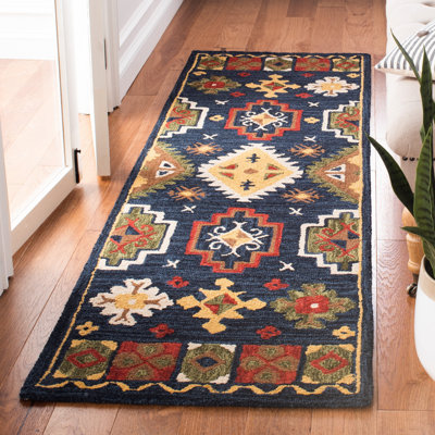 Tapis oriental bleu marine en laine touffeté à la main Gradin