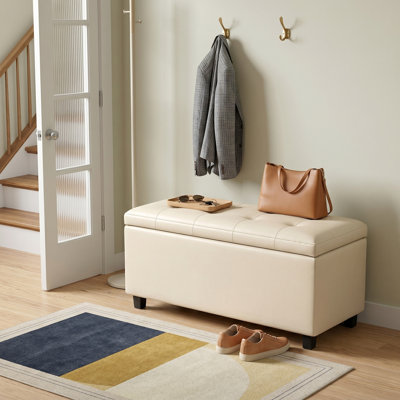 Banc repose-pieds avec rangement caché Cosmopolitan