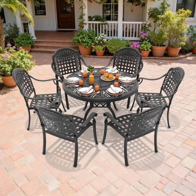 Ensemble de salle à manger de patio rond 6 personnes 47,24 po avec trou pour parasol, 6 chaises empilables avec coussins bleus