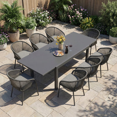 Ensemble repas pour 8 personnes avec table rectangulaire extensible et chaise empilable, coussins inclus